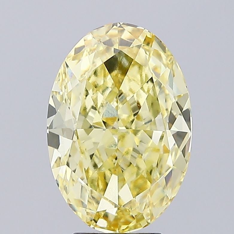 Loose Diamond - OVAL 5.1ct Fancy Vivid Yellow VVS2: Loose Diamond - OVAL 5.1ct Fancy Vivid Yellow VVS2 Source: This is a real non-mined Diamond that has been grown in a lab Shape: OVAL Carats: 5.1 Color: Fancy Vivid Yellow Certification: IGI Video: