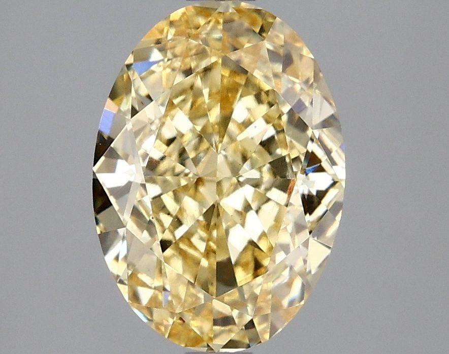 Loose Diamond - OVAL 3.03ct Fancy Intense Yellow VS1: Loose Diamond - OVAL 3.03ct Fancy Intense Yellow VS1 Source: This is a real non-mined Diamond that has been grown in a lab Shape: OVAL Carats: 3.03 Color: Fancy Intense Yellow Certification: IGI Video