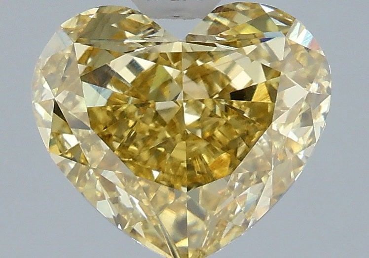 Loose Diamond - HEART 3.05ct Fancy Intense Yellow VS1: Loose Diamond - HEART 3.05ct Fancy Intense Yellow VS1 Source: This is a real non-mined Diamond that has been grown in a lab Shape: HEART Carats: 3.05 Color: Fancy Intense Yellow Certification: IGI Vid