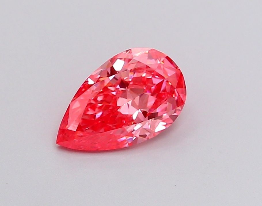 Loose Diamond - PEAR 1.0ct Fancy Vivid Pink VS2: Loose Diamond - PEAR 1.0ct Fancy Vivid Pink VS2 Source: This is a real non-mined Diamond that has been grown in a lab Shape: PEAR Carats: 1.0 Color: Fancy Vivid Pink Certification: IGI Video: