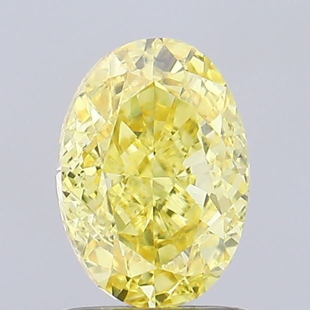Loose Diamond - OVAL 1.37ct Fancy Vivid Yellow VVS2: Loose Diamond - OVAL 1.37ct Fancy Vivid Yellow VVS2 Source: This is a real non-mined Diamond that has been grown in a lab Shape: OVAL Carats: 1.37 Color: Fancy Vivid Yellow Certification: IGI The Diam