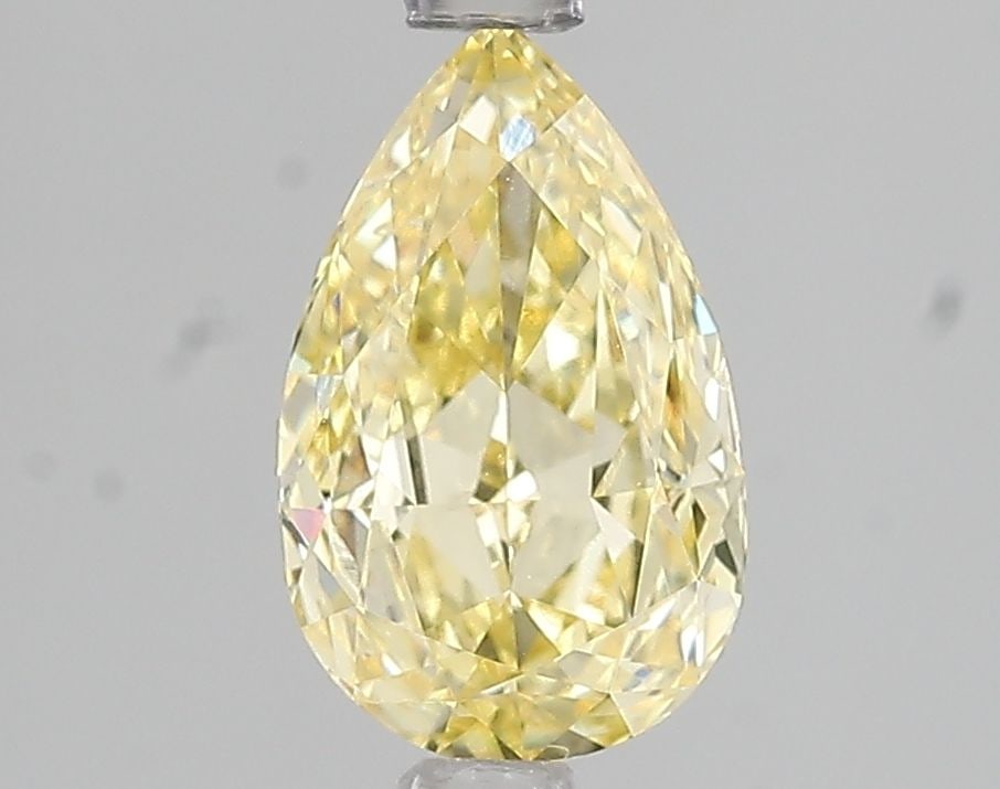 Loose Diamond - PEAR 1.57ct Fancy Intense Yellow SI1: Loose Diamond - PEAR 1.57ct Fancy Intense Yellow SI1 Source: This is a real non-mined Diamond that has been grown in a lab Shape: PEAR Carats: 1.57 Color: Fancy Intense Yellow Certification: IGI Video