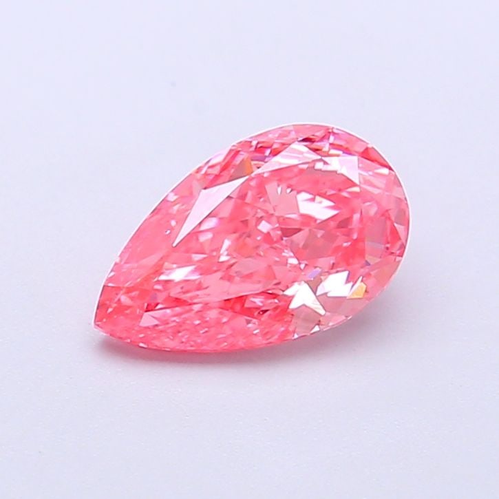 Loose Diamond - PEAR 1.0ct Fancy Vivid Pink VS2: Loose Diamond - PEAR 1.0ct Fancy Vivid Pink VS2 Source: This is a real non-mined Diamond that has been grown in a lab Shape: PEAR Carats: 1.0 Color: Fancy Vivid Pink Certification: IGI Video: