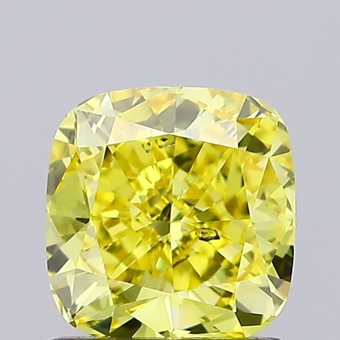 Loose Diamond - CUSHION BRILLIANT 1.07ct Fancy Vivid Yellow SI1: Loose Diamond - CUSHION BRILLIANT 1.07ct Fancy Vivid Yellow SI1 Source: This is a real non-mined Diamond that has been grown in a lab Shape: CUSHION BRILLIANT Carats: 1.07 Color: Fancy Vivid Yellow Ce