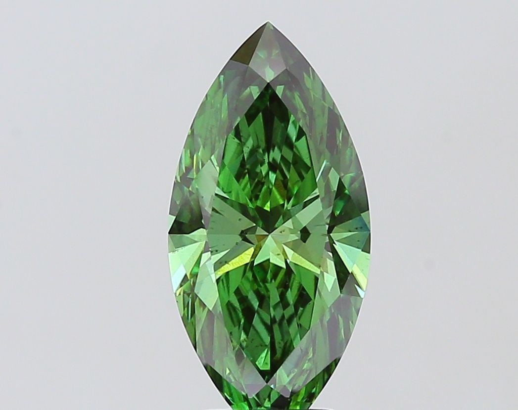Loose Diamond - MARQUISE 3.02ct Fancy Vivid Green SI1: Loose Diamond - MARQUISE 3.02ct Fancy Vivid Green SI1 Source: This is a real non-mined Diamond that has been grown in a lab Shape: MARQUISE Carats: 3.02 Color: Fancy Vivid Green Certification: IGI The