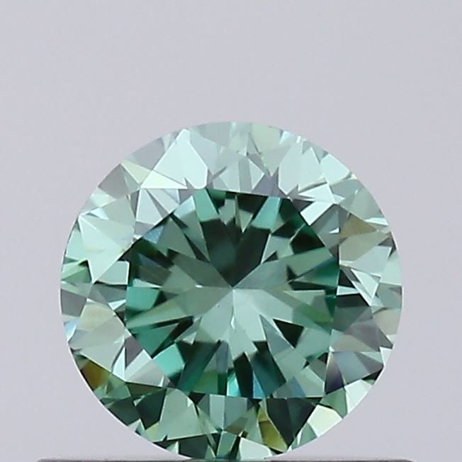 Loose Diamond - ROUND 0.48ct Fancy Vivid Green VVS2: Loose Diamond - ROUND 0.48ct Fancy Vivid Green VVS2 Source: This is a real non-mined Diamond that has been grown in a lab Shape: ROUND Carats: 0.48 Color: Fancy Vivid Green Certification: IGI The Diam
