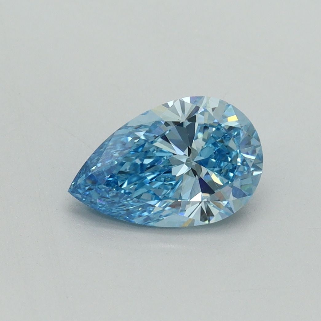 Loose Diamond - PEAR 1.03ct Fancy Vivid Blue VS1: Loose Diamond - PEAR 1.03ct Fancy Vivid Blue VS1 Source: This is a real non-mined Diamond that has been grown in a lab Shape: PEAR Carats: 1.03 Color: Fancy Vivid Blue Certification: IGI Video: