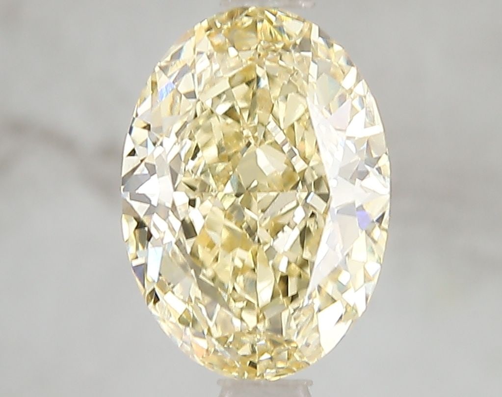 Loose Diamond - OVAL 3.09ct Fancy Intense Yellow VS1: Loose Diamond - OVAL 3.09ct Fancy Intense Yellow VS1 Source: This is a real non-mined Diamond that has been grown in a lab Shape: OVAL Carats: 3.09 Color: Fancy Intense Yellow Certification: IGI Video