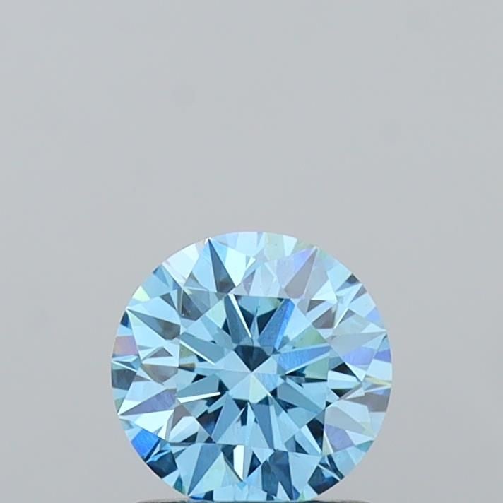Ideal Loose Diamond - ROUND 1.0ct Fancy Vivid Blue VS1: Ideal Loose Diamond - ROUND 1.0ct Fancy Vivid Blue VS1 Source: This is a real non-mined Diamond that has been grown in a lab Shape: ROUND Carats: 1.0 Color: Fancy Vivid Blue Certification: IGI Video: