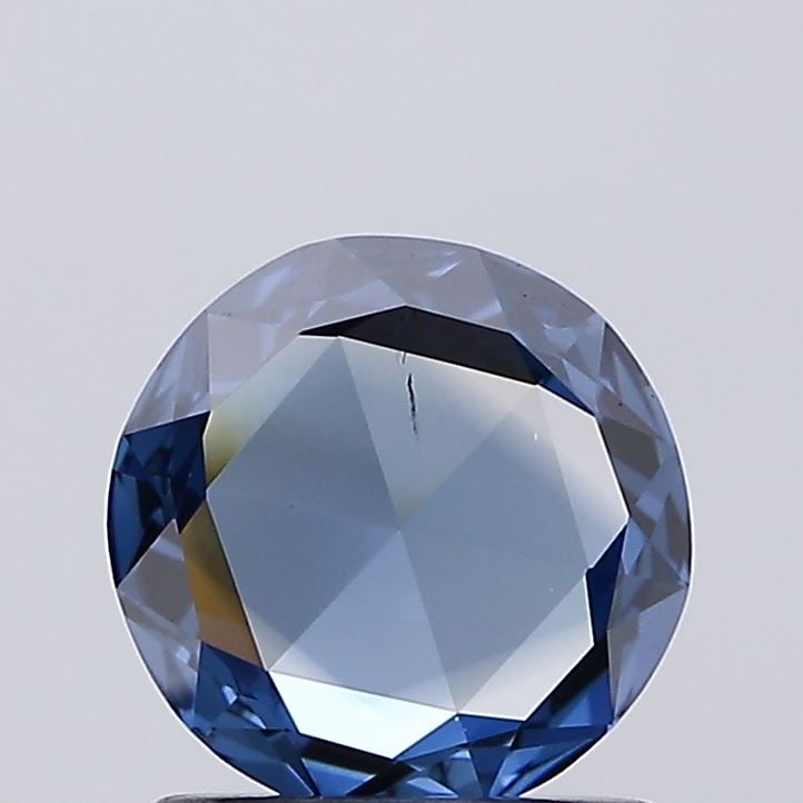 Loose Diamond - ROSE 0.61ct Fancy Vivid Blue SI1: Loose Diamond - ROSE 0.61ct Fancy Vivid Blue SI1 Source: This is a real non-mined Diamond that has been grown in a lab Shape: ROSE Carats: 0.61 Color: Fancy Vivid Blue Certification: IGI Video:
