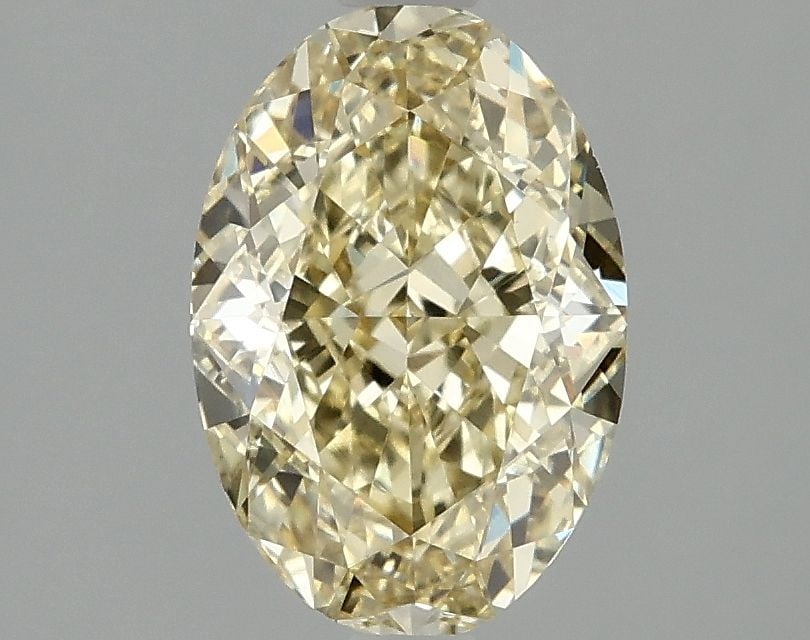 Loose Diamond - OVAL 2.1ct Fancy Yellow VVS2: Loose Diamond - OVAL 2.1ct Fancy Yellow VVS2 Source: This is a real non-mined Diamond that has been grown in a lab Shape: OVAL Carats: 2.1 Color: Fancy Yellow Certification: IGI Video: