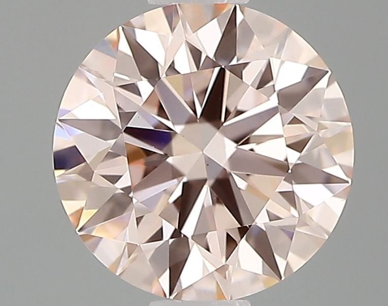 Ideal Loose Diamond - ROUND 0.72ct Fancy Intense Pink VS1: Ideal Loose Diamond - ROUND 0.72ct Fancy Intense Pink VS1 Source: This is a real non-mined Diamond that has been grown in a lab Shape: ROUND Carats: 0.72 Color: Fancy Intense Pink Certification: IGI V