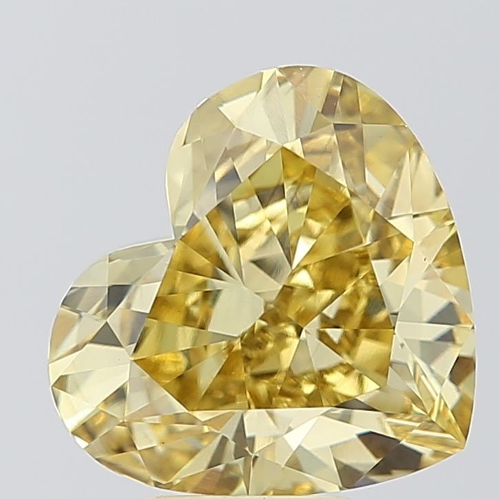 Loose Diamond - HEART 5.76ct Fancy Vivid Yellow VS1: Loose Diamond - HEART 5.76ct Fancy Vivid Yellow VS1 Source: This is a real non-mined Diamond that has been grown in a lab Shape: HEART Carats: 5.76 Color: Fancy Vivid Yellow Certification: IGI Video: