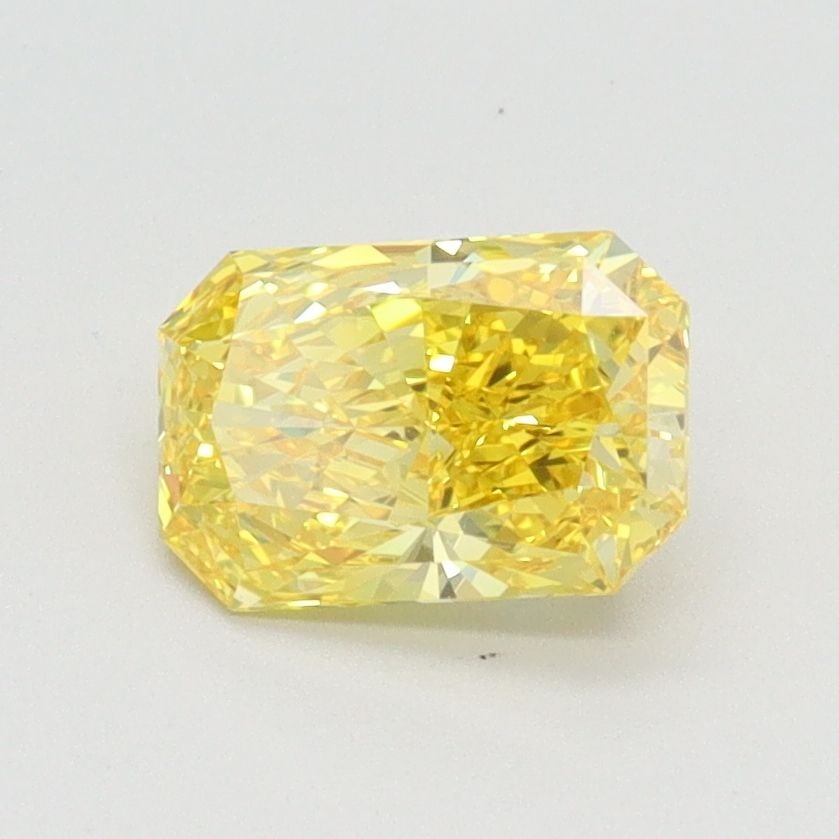 Loose Diamond - RADIANT 1.01ct Fancy Vivid Yellow IF: Loose Diamond - RADIANT 1.01ct Fancy Vivid Yellow IF Source: This is a real non-mined Diamond that has been grown in a lab Shape: RADIANT Carats: 1.01 Color: Fancy Vivid Yellow Certification: IGI Vide