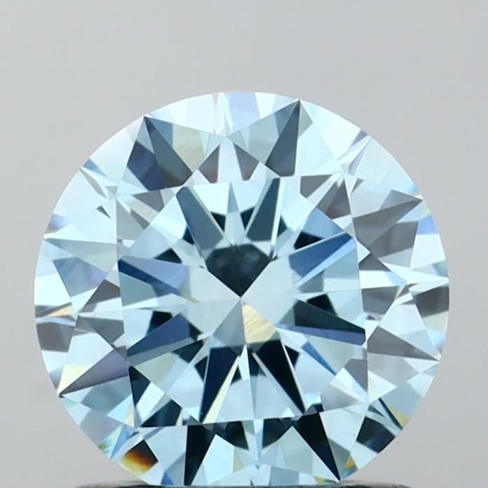 Loose Diamond - ROUND 0.93ct Fancy Vivid Blue VVS2: Loose Diamond - ROUND 0.93ct Fancy Vivid Blue VVS2 Source: This is a real non-mined Diamond that has been grown in a lab Shape: ROUND Carats: 0.93 Color: Fancy Vivid Blue Certification: IGI Video: