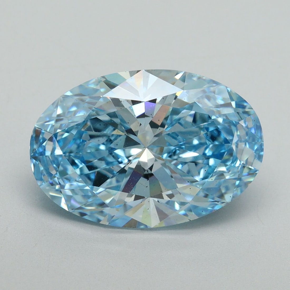 Loose Diamond - OVAL 5.16ct Fancy Vivid Blue VS2: Loose Diamond - OVAL 5.16ct Fancy Vivid Blue VS2 Source: This is a real non-mined Diamond that has been grown in a lab Shape: OVAL Carats: 5.16 Color: Fancy Vivid Blue Certification: IGI Video: