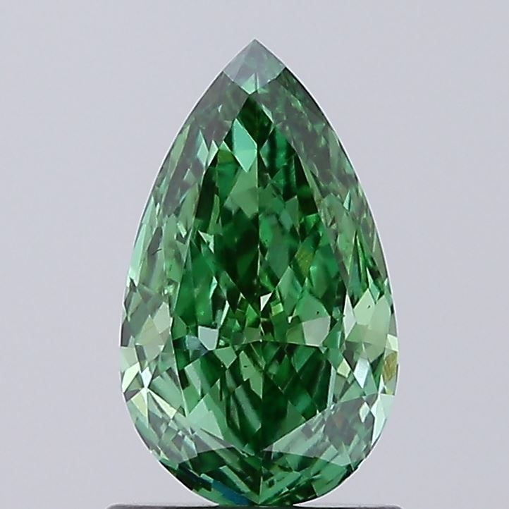 Loose Diamond - PEAR 1.03ct Fancy Vivid Green VS1: Loose Diamond - PEAR 1.03ct Fancy Vivid Green VS1 Source: This is a real non-mined Diamond that has been grown in a lab Shape: PEAR Carats: 1.03 Color: Fancy Vivid Green Certification: IGI Video: