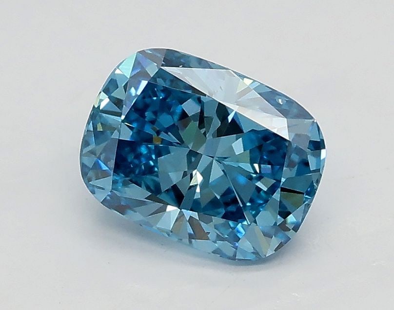 Loose Diamond - CUSHION BRILLIANT 0.9ct Fancy Vivid Blue VS2: Loose Diamond - CUSHION BRILLIANT 0.9ct Fancy Vivid Blue VS2 Source: This is a real non-mined Diamond that has been grown in a lab Shape: CUSHION BRILLIANT Carats: 0.9 Color: Fancy Vivid Blue Certific