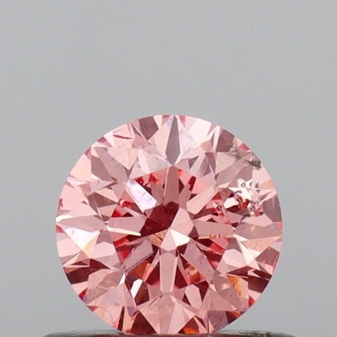 Loose Diamond - ROUND 0.44ct Fancy Vivid Pink SI2: Loose Diamond - ROUND 0.44ct Fancy Vivid Pink SI2 Source: This is a real non-mined Diamond that has been grown in a lab Shape: ROUND Carats: 0.44 Color: Fancy Vivid Pink Certification: IGI Video: