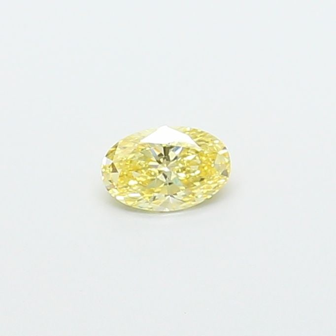 Loose Diamond - OVAL 0.3ct Fancy Yellow VVS2: Loose Diamond - OVAL 0.3ct Fancy Yellow VVS2 Source: This is a real non-mined Diamond that has been grown in a lab Shape: OVAL Carats: 0.3 Color: Fancy Yellow Certification: IGI The Diamond Depot Guar