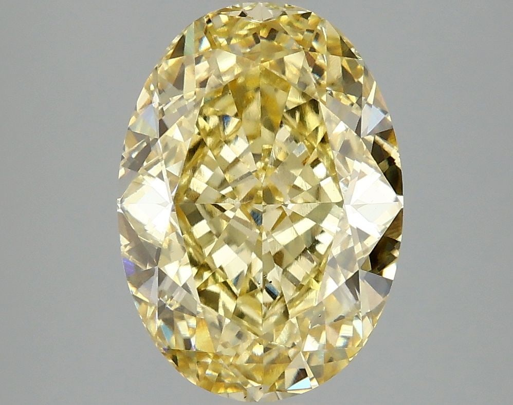 Loose Diamond - OVAL 4.03ct Fancy Vivid Yellow VS2: Loose Diamond - OVAL 4.03ct Fancy Vivid Yellow VS2 Source: This is a real non-mined Diamond that has been grown in a lab Shape: OVAL Carats: 4.03 Color: Fancy Vivid Yellow Certification: IGI Video: