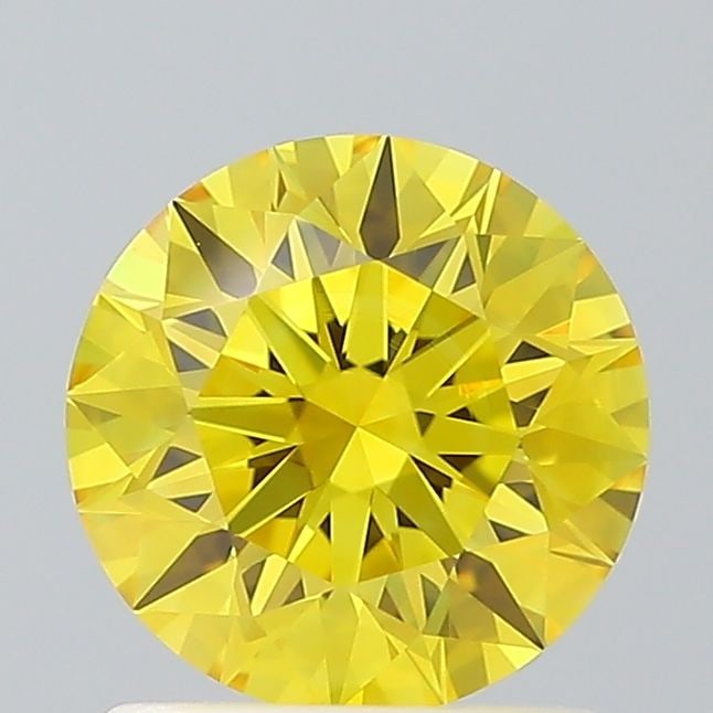 Ideal Loose Diamond - ROUND 1.09ct Fancy Vivid Yellow VS1: Ideal Loose Diamond - ROUND 1.09ct Fancy Vivid Yellow VS1 Source: This is a real non-mined Diamond that has been grown in a lab Shape: ROUND Carats: 1.09 Color: Fancy Vivid Yellow Certification: IGI V