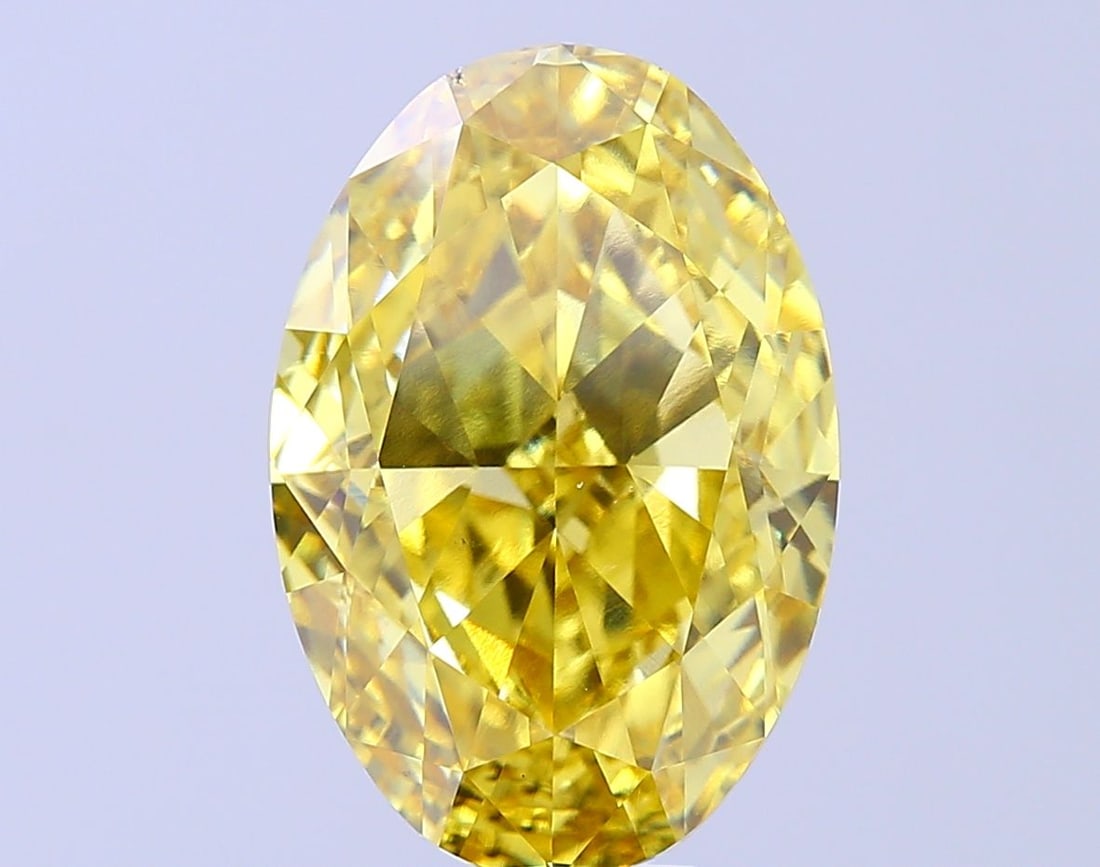 Loose Diamond - OVAL 10.0ct Fancy Vivid Yellow VS1: Loose Diamond - OVAL 10.0ct Fancy Vivid Yellow VS1 Source: This is a real non-mined Diamond that has been grown in a lab Shape: OVAL Carats: 10.0 Color: Fancy Vivid Yellow Certification: IGI Video: