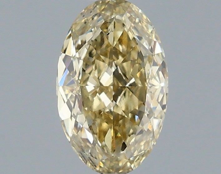 Loose Diamond - OVAL 1.01ct Fancy Yellow VS2: Loose Diamond - OVAL 1.01ct Fancy Yellow VS2 Source: This is a real non-mined Diamond that has been grown in a lab Shape: OVAL Carats: 1.01 Color: Fancy Yellow Certification: IGI Video: