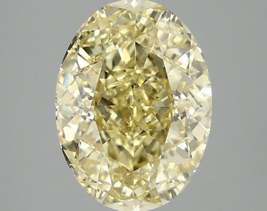 Loose Diamond - OVAL 3.09ct Fancy Vivid Yellow VS1: Loose Diamond - OVAL 3.09ct Fancy Vivid Yellow VS1 Source: This is a real non-mined Diamond that has been grown in a lab Shape: OVAL Carats: 3.09 Color: Fancy Vivid Yellow Certification: IGI Video:
