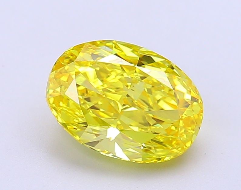 Loose Diamond - OVAL 2.09ct Fancy Vivid Yellow VS2: Loose Diamond - OVAL 2.09ct Fancy Vivid Yellow VS2 Source: This is a real non-mined Diamond that has been grown in a lab Shape: OVAL Carats: 2.09 Color: Fancy Vivid Yellow Certification: IGI Video: