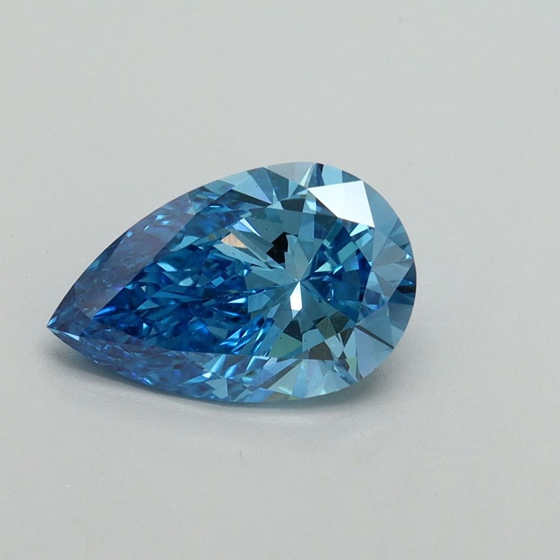 Loose Diamond - PEAR 1.59ct Fancy Vivid Blue VS2: Loose Diamond - PEAR 1.59ct Fancy Vivid Blue VS2 Source: This is a real non-mined Diamond that has been grown in a lab Shape: PEAR Carats: 1.59 Color: Fancy Vivid Blue Certification: IGI Video:
