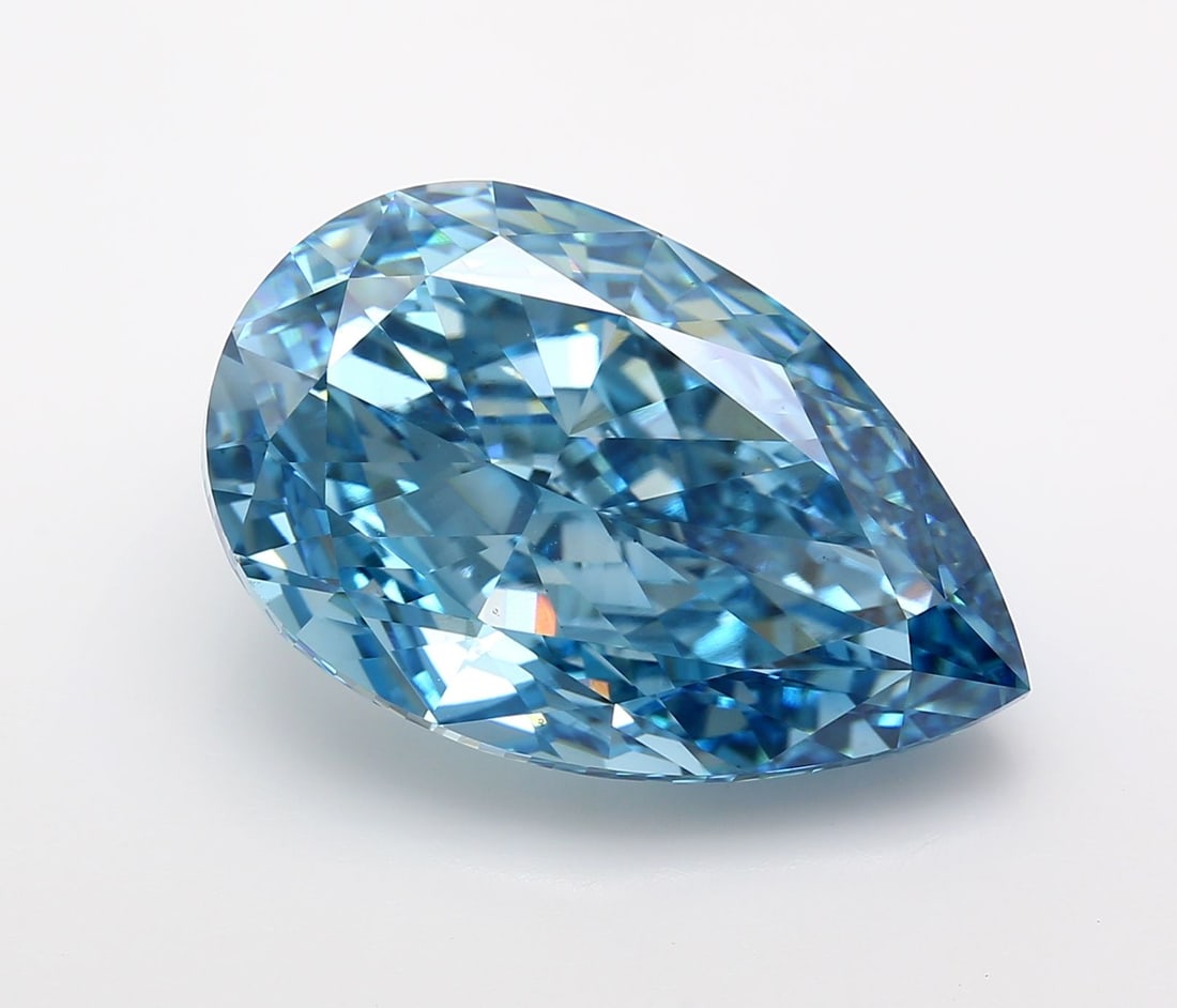 Loose Diamond - PEAR 21.33ct Fancy Vivid Blue VS1: Loose Diamond - PEAR 21.33ct Fancy Vivid Blue VS1 Source: This is a real non-mined Diamond that has been grown in a lab Shape: PEAR Carats: 21.33 Color: Fancy Vivid Blue Certification: IGI Video: