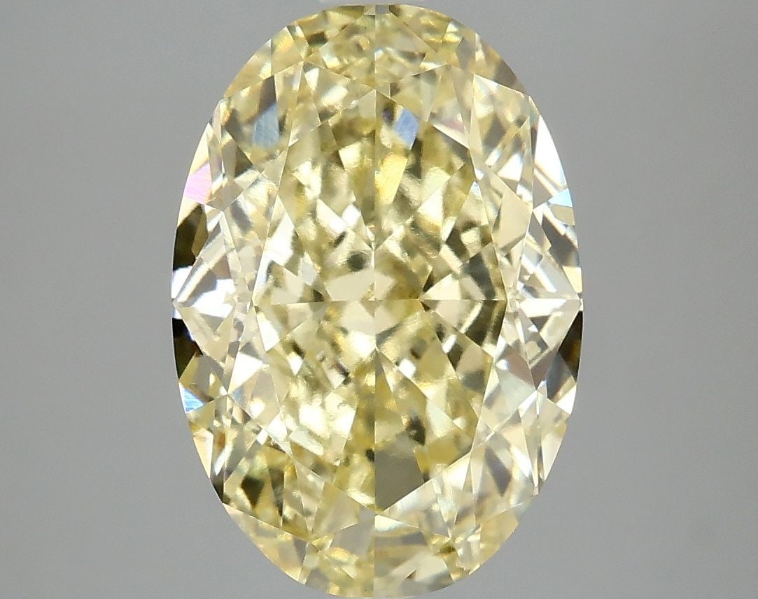 Loose Diamond - OVAL 5.09ct Fancy Intense Yellow SI1: Loose Diamond - OVAL 5.09ct Fancy Intense Yellow SI1 Source: This is a real non-mined Diamond that has been grown in a lab Shape: OVAL Carats: 5.09 Color: Fancy Intense Yellow Certification: IGI Video