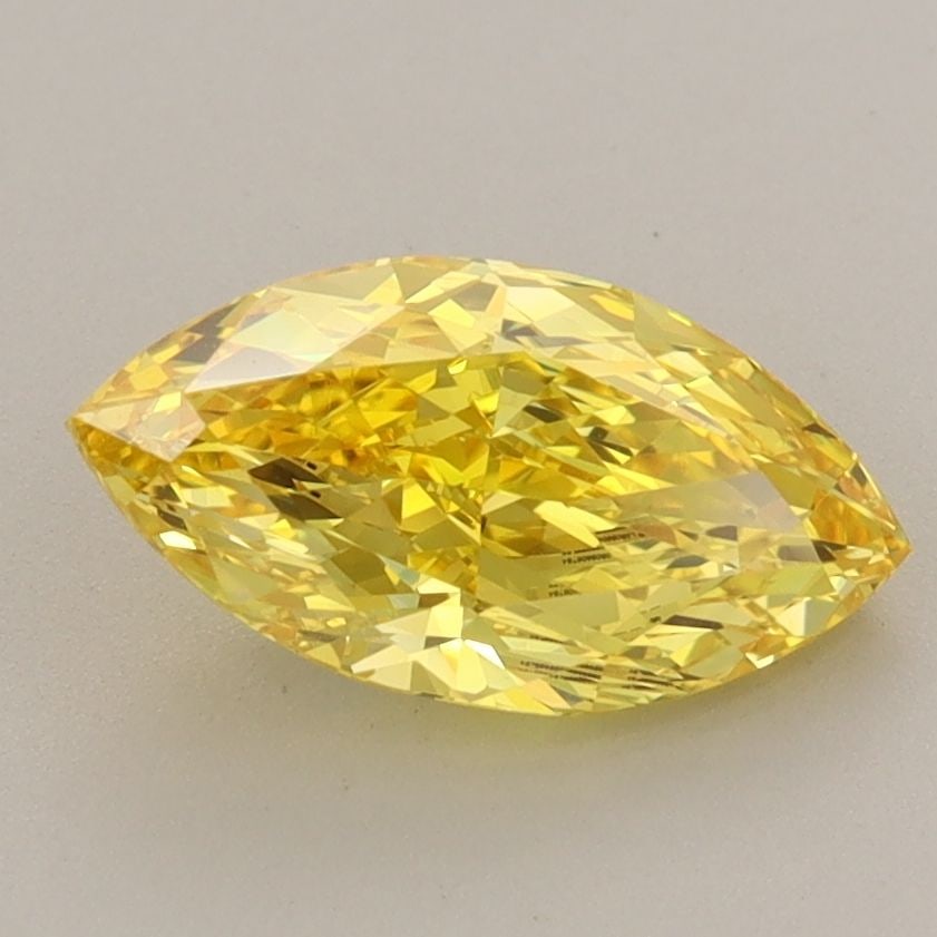 Loose Diamond - MARQUISE 1.61ct Fancy Vivid Yellow VVS2: Loose Diamond - MARQUISE 1.61ct Fancy Vivid Yellow VVS2 Source: This is a real non-mined Diamond that has been grown in a lab Shape: MARQUISE Carats: 1.61 Color: Fancy Vivid Yellow Certification: IGI 