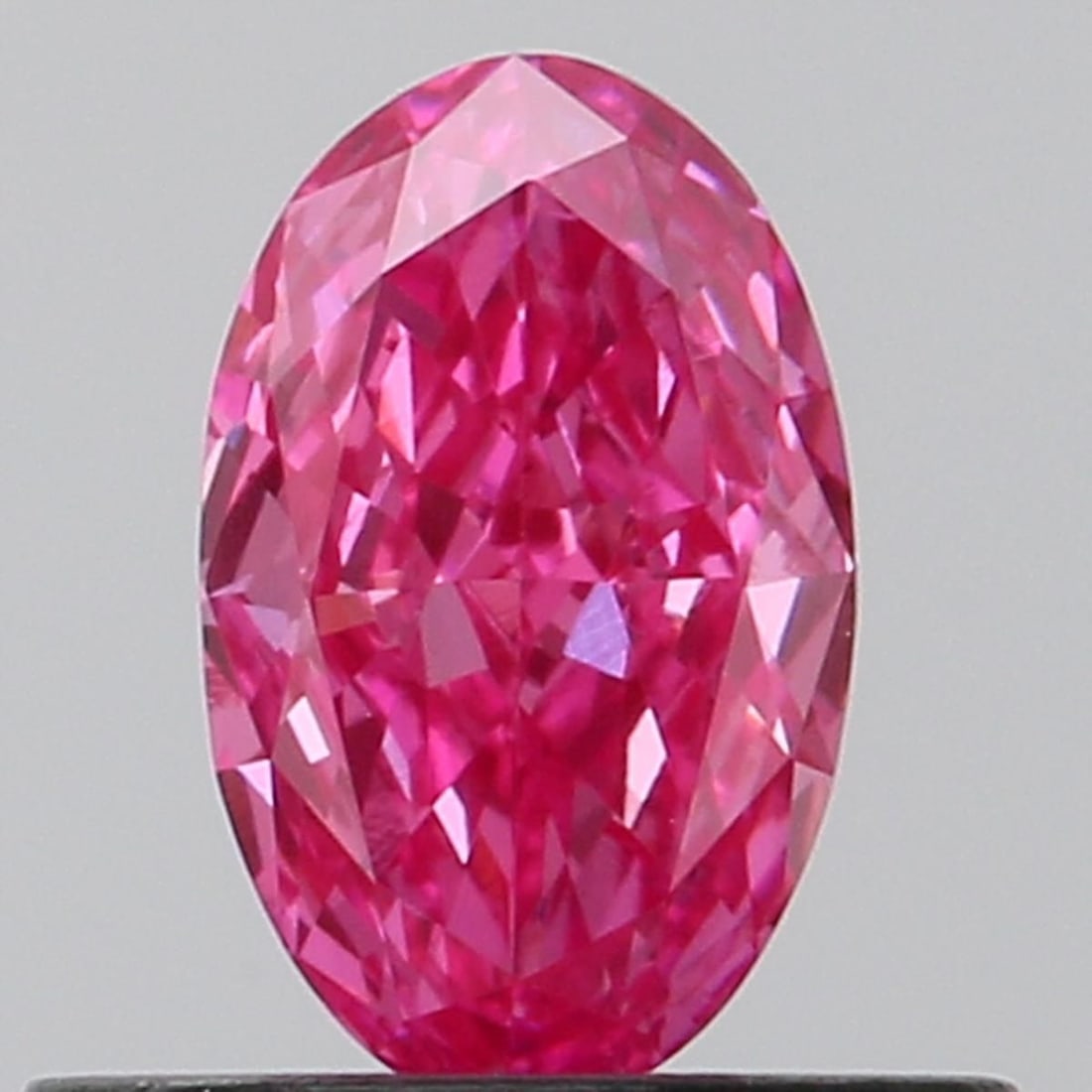 Loose Diamond - OVAL 0.42ct Fancy Vivid Pink VS2: Loose Diamond - OVAL 0.42ct Fancy Vivid Pink VS2 Source: This is a real non-mined Diamond that has been grown in a lab Shape: OVAL Carats: 0.42 Color: Fancy Vivid Pink Certification: NONE Video: