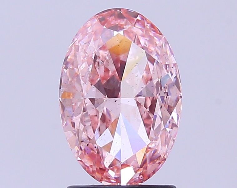 Loose Diamond - OVAL 2.07ct Fancy Vivid Pink SI1: Loose Diamond - OVAL 2.07ct Fancy Vivid Pink SI1 Source: This is a real non-mined Diamond that has been grown in a lab Shape: OVAL Carats: 2.07 Color: Fancy Vivid Pink Certification: IGI Video:
