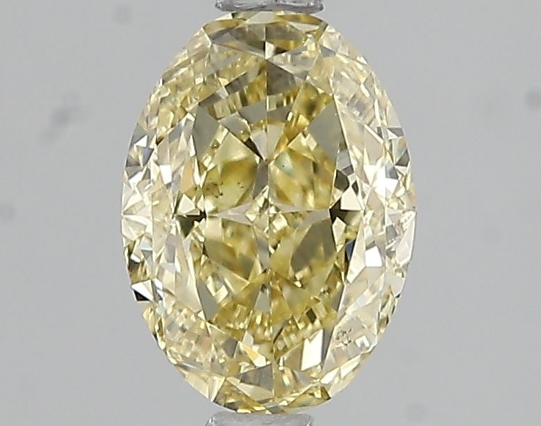Loose Diamond - OVAL 1.51ct Fancy Intense Yellow VS2: Loose Diamond - OVAL 1.51ct Fancy Intense Yellow VS2 Source: This is a real non-mined Diamond that has been grown in a lab Shape: OVAL Carats: 1.51 Color: Fancy Intense Yellow Certification: IGI Video