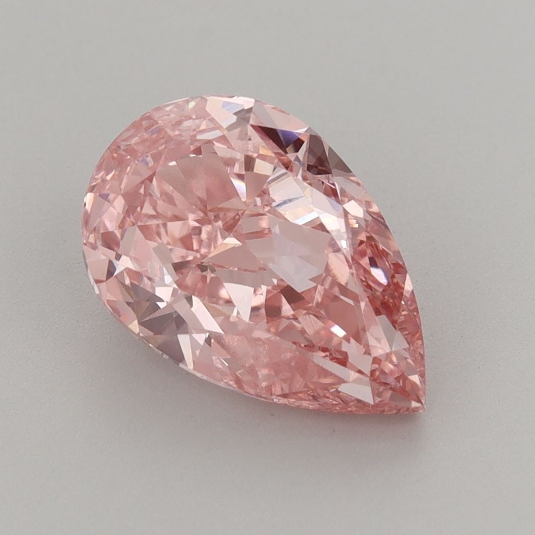 Loose Diamond - PEAR 3.04ct Fancy Vivid Pink VVS2: Loose Diamond - PEAR 3.04ct Fancy Vivid Pink VVS2 Source: This is a real non-mined Diamond that has been grown in a lab Shape: PEAR Carats: 3.04 Color: Fancy Vivid Pink Certification: IGI Video:
