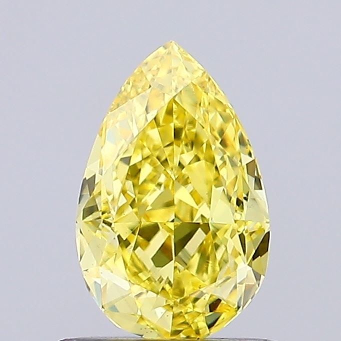Loose Diamond - PEAR 0.72ct Fancy Vivid Yellow VS1: Loose Diamond - PEAR 0.72ct Fancy Vivid Yellow VS1 Source: This is a real non-mined Diamond that has been grown in a lab Shape: PEAR Carats: 0.72 Color: Fancy Vivid Yellow Certification: NONE Video: