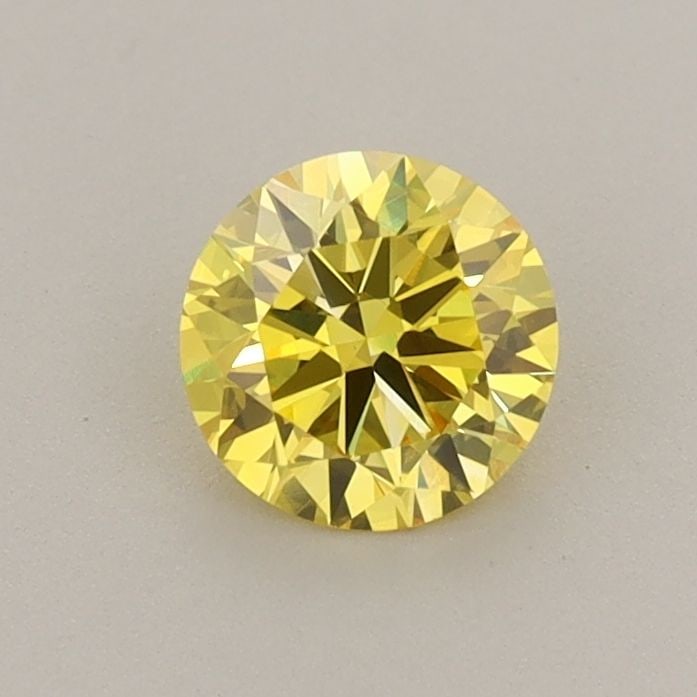 Ideal Loose Diamond - ROUND 0.63ct Fancy Vivid Yellow VS1: Ideal Loose Diamond - ROUND 0.63ct Fancy Vivid Yellow VS1 Source: This is a real non-mined Diamond that has been grown in a lab Shape: ROUND Carats: 0.63 Color: Fancy Vivid Yellow Certification: IGI V