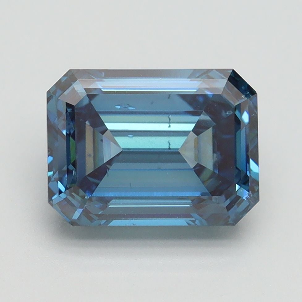 Loose Diamond - EMERALD 3.01ct Fancy Vivid Blue SI1: Loose Diamond - EMERALD 3.01ct Fancy Vivid Blue SI1 Source: This is a real non-mined Diamond that has been grown in a lab Shape: EMERALD Carats: 3.01 Color: Fancy Vivid Blue Certification: IGI Video: