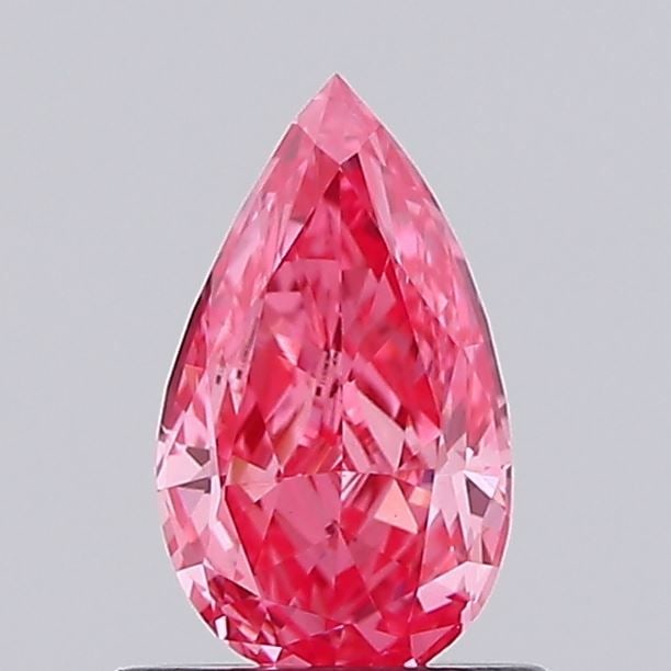 Loose Diamond - PEAR 0.6ct Fancy Vivid Pink VVS2: Loose Diamond - PEAR 0.6ct Fancy Vivid Pink VVS2 Source: This is a real non-mined Diamond that has been grown in a lab Shape: PEAR Carats: 0.6 Color: Fancy Vivid Pink Certification: IGI Video: