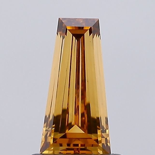 Loose Diamond - TAPERED BAGUETTE 0.78ct Fancy Orangey Brown VS1: Loose Diamond - TAPERED BAGUETTE 0.78ct Fancy Orangey Brown VS1 Source: This is a real non-mined Diamond that has been grown in a lab Shape: TAPERED BAGUETTE Carats: 0.78 Color: Fancy Orangey Brown Ce