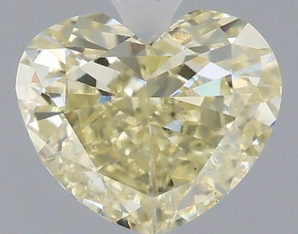 Loose Diamond - HEART 1.54ct Fancy Light Yellow VS1: Loose Diamond - HEART 1.54ct Fancy Light Yellow VS1 Source: This is a real non-mined Diamond that has been grown in a lab Shape: HEART Carats: 1.54 Color: Fancy Light Yellow Certification: IGI Video: