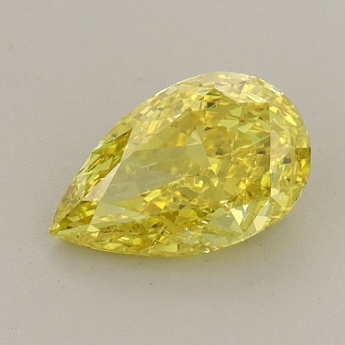 Loose Diamond - PEAR 0.71ct Fancy Vivid Yellow VS1: Loose Diamond - PEAR 0.71ct Fancy Vivid Yellow VS1 Source: This is a real non-mined Diamond that has been grown in a lab Shape: PEAR Carats: 0.71 Color: Fancy Vivid Yellow Certification: IGI Video: