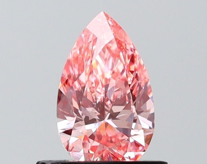 Loose Diamond - PEAR 0.75ct Fancy Vivid Pink VVS2: Loose Diamond - PEAR 0.75ct Fancy Vivid Pink VVS2 Source: This is a real non-mined Diamond that has been grown in a lab Shape: PEAR Carats: 0.75 Color: Fancy Vivid Pink Certification: NONE Video: