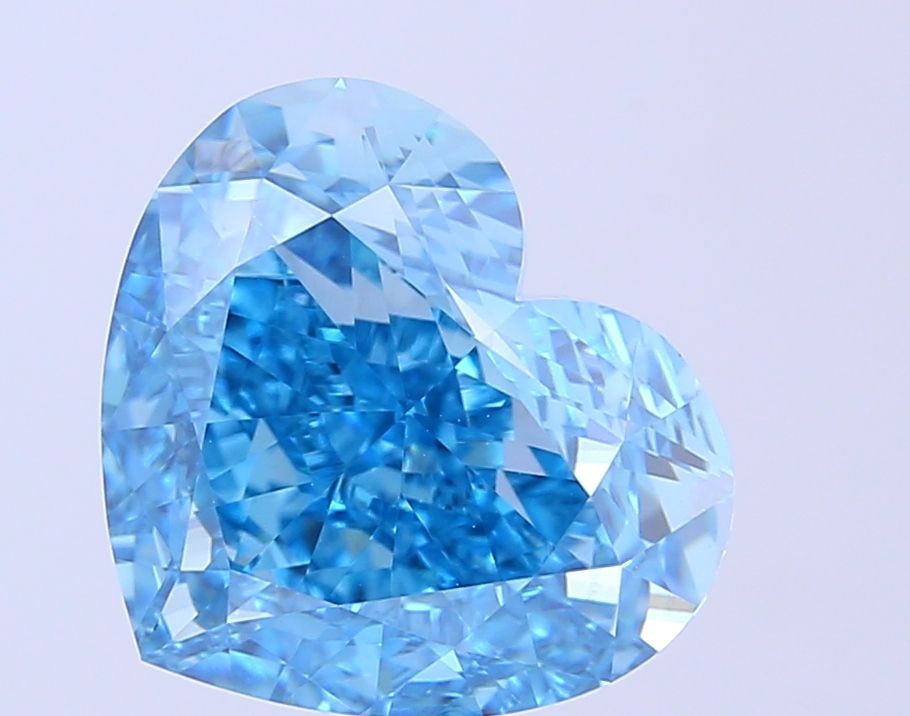 Loose Diamond - HEART 6.68ct Fancy Vivid Blue VVS2: Loose Diamond - HEART 6.68ct Fancy Vivid Blue VVS2 Source: This is a real non-mined Diamond that has been grown in a lab Shape: HEART Carats: 6.68 Color: Fancy Vivid Blue Certification: IGI Video: