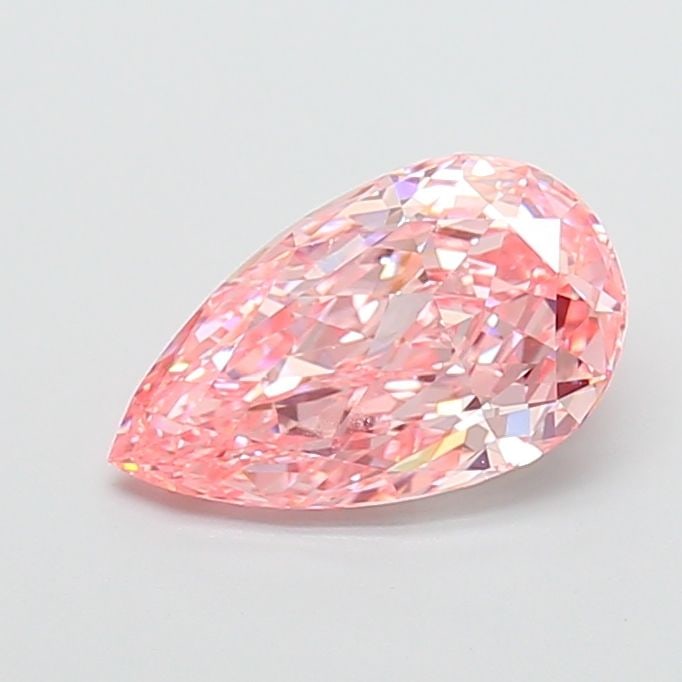 Loose Diamond - PEAR 2.78ct Fancy Vivid Pink VVS2: Loose Diamond - PEAR 2.78ct Fancy Vivid Pink VVS2 Source: This is a real non-mined Diamond that has been grown in a lab Shape: PEAR Carats: 2.78 Color: Fancy Vivid Pink Certification: IGI Video: