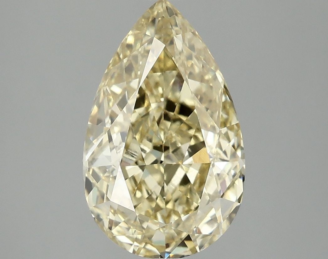 Loose Diamond - PEAR 3.08ct Fancy Vivid Yellow VS1: Loose Diamond - PEAR 3.08ct Fancy Vivid Yellow VS1 Source: This is a real non-mined Diamond that has been grown in a lab Shape: PEAR Carats: 3.08 Color: Fancy Vivid Yellow Certification: IGI Video: