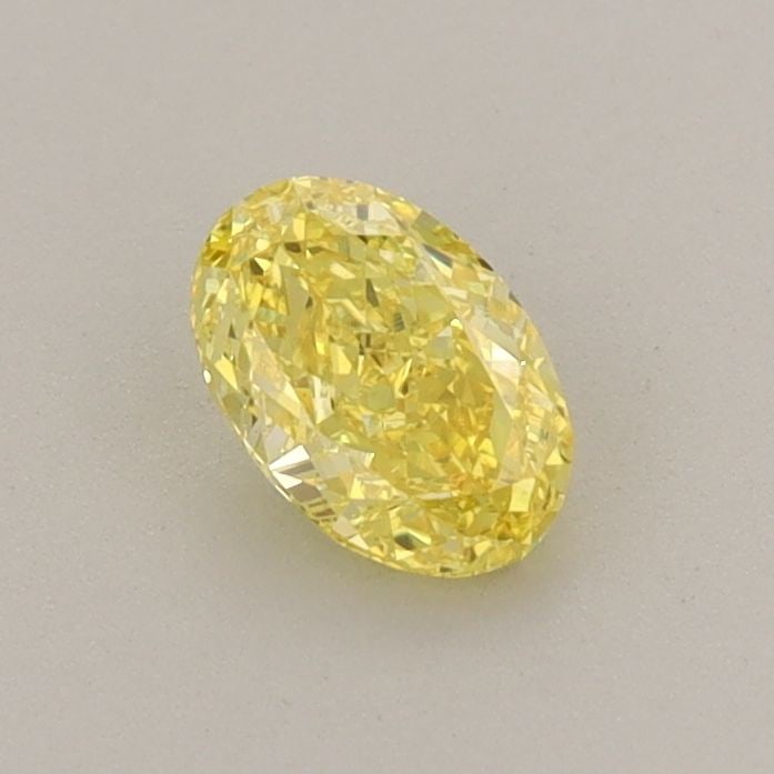 Loose Diamond - OVAL 0.5ct Fancy Vivid Yellow VS1: Loose Diamond - OVAL 0.5ct Fancy Vivid Yellow VS1 Source: This is a real non-mined Diamond that has been grown in a lab Shape: OVAL Carats: 0.5 Color: Fancy Vivid Yellow Certification: IGI Video:
